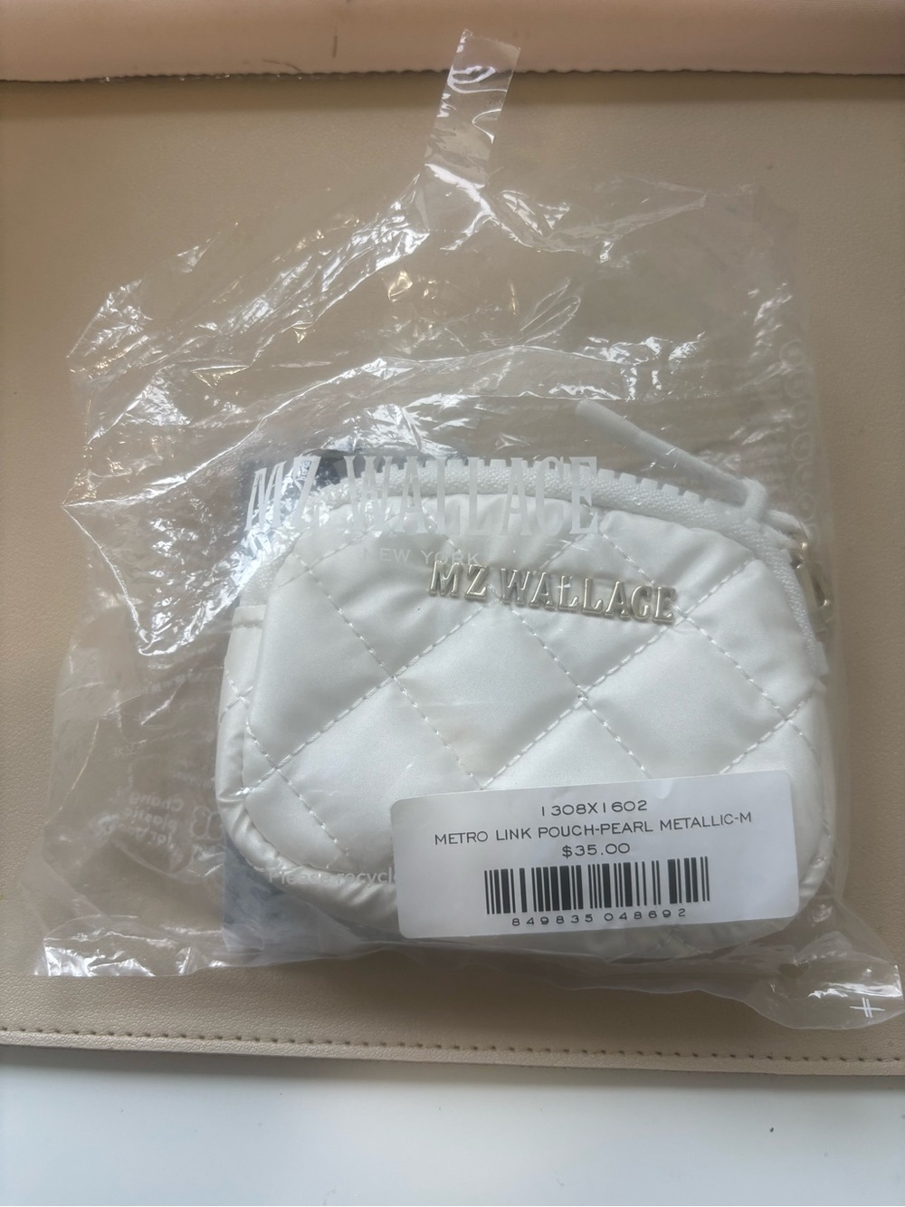 MZ Wallace Pearl Quilted Metro Link Pouch in White with Metallic Logo